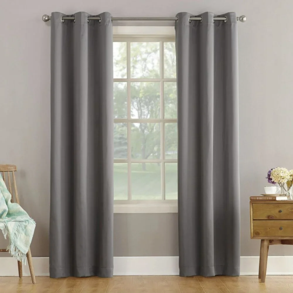New in package 2 panels of window drapes 40x63” 2 tones gray 6 silver grommets